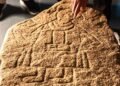 Rare 12th-century picture stone with Christian figure depiction uncovered in Germany