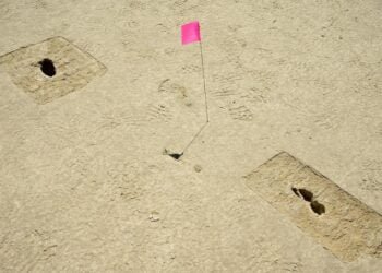 Footprints discovered on an archaeological site are marked with a pin flag on the Utah Test and Training Range, July 18, 2022. In compliance with Section 106 of the National Historic Preservation Act, the Air Force works closely with the Utah State Historic Preservation Office to explore, discover, and preserve historical and cultural artifacts on the UTTR.