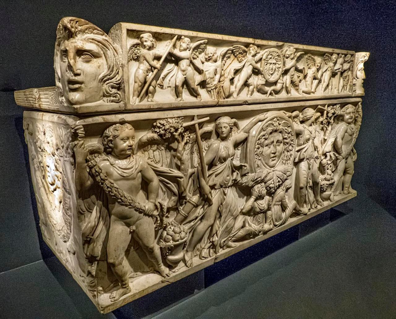 A Roman sarcophagus depicting winged victories, captured barbarians and gorgons symbolizing victory over death 210 CE