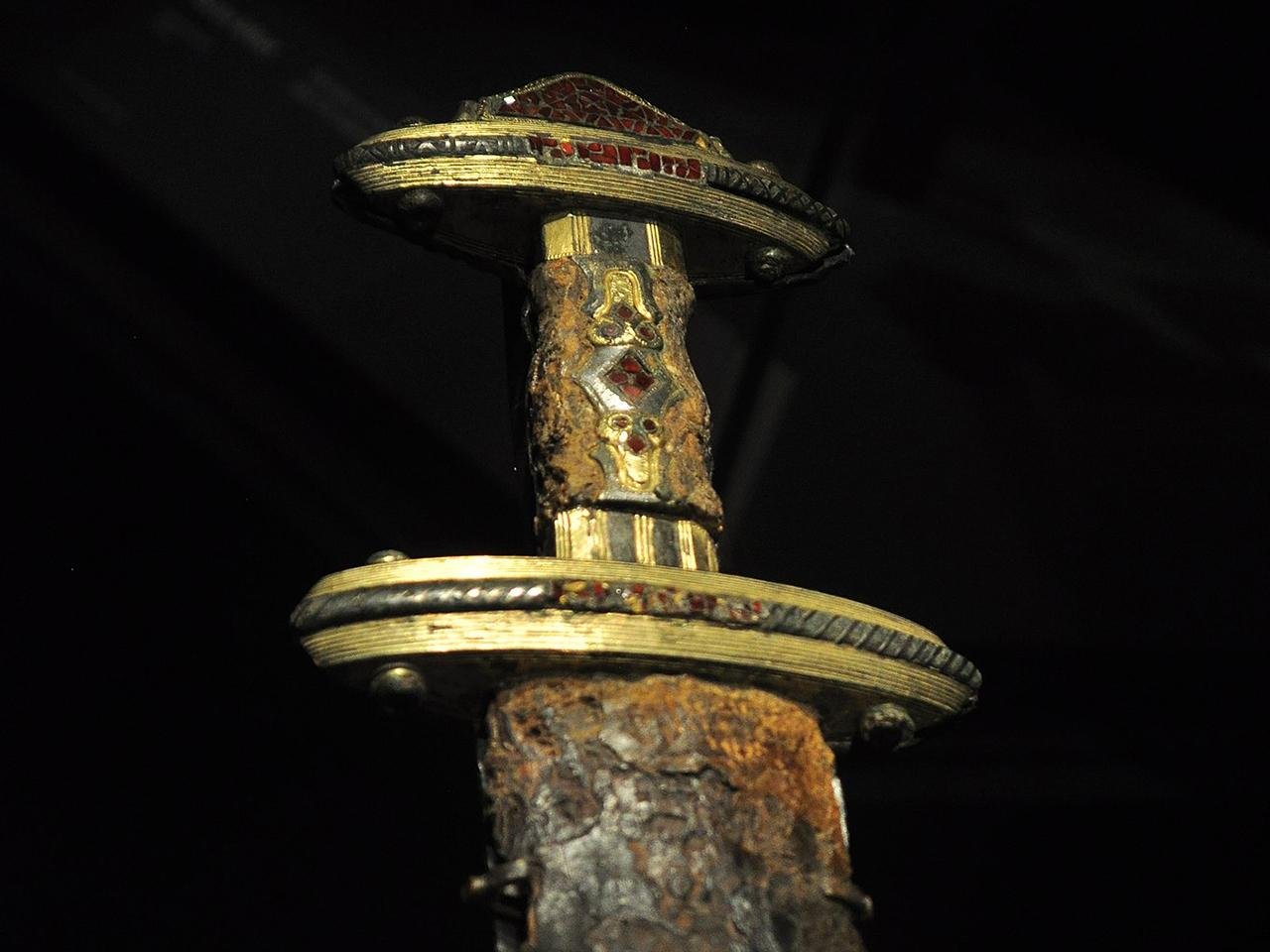 Hilt of a Viking sword and extreme upper portion of scabbard, 7th century. 