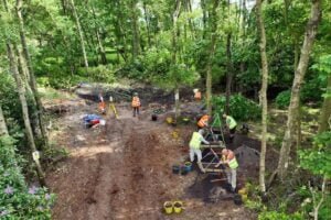 Archaeologists search WWII B-17 crash site in England to find missing pilot