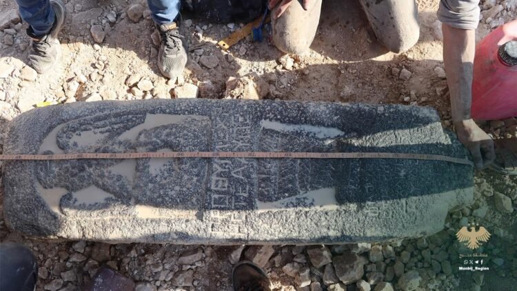 2,000-year-old Roman basalt stele with eagle and Greek inscription unearthed in Manbij, Syria. Credit: Directorate of Museums and Antiquities
