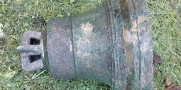 Buried church bell found in Poland after decades hidden beneath roadside
