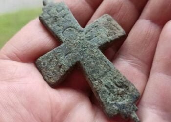 Polish archaeologists find a rare cross-shaped reliquary belonging to a medieval knight
