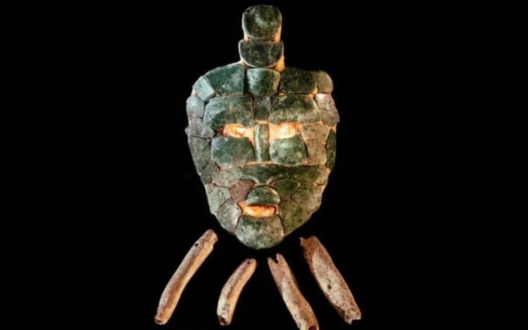 A team of researchers has uncovered an intact jade mask in the tomb of a Maya King at the archaeological site of Chochkitam in Guatemala.