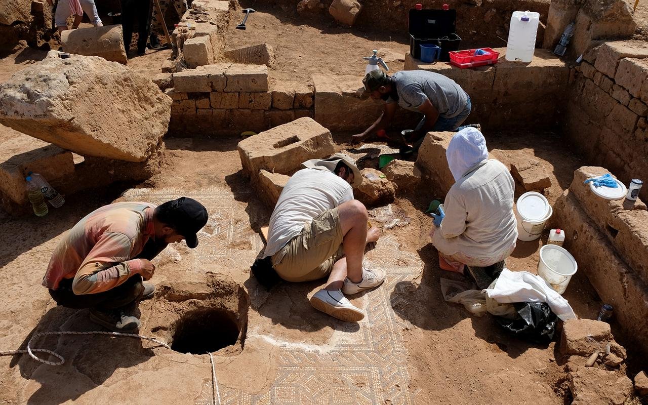 Archaeologists uncover mysterious mask and advanced water system in ancient Libyan city of Ptolemais