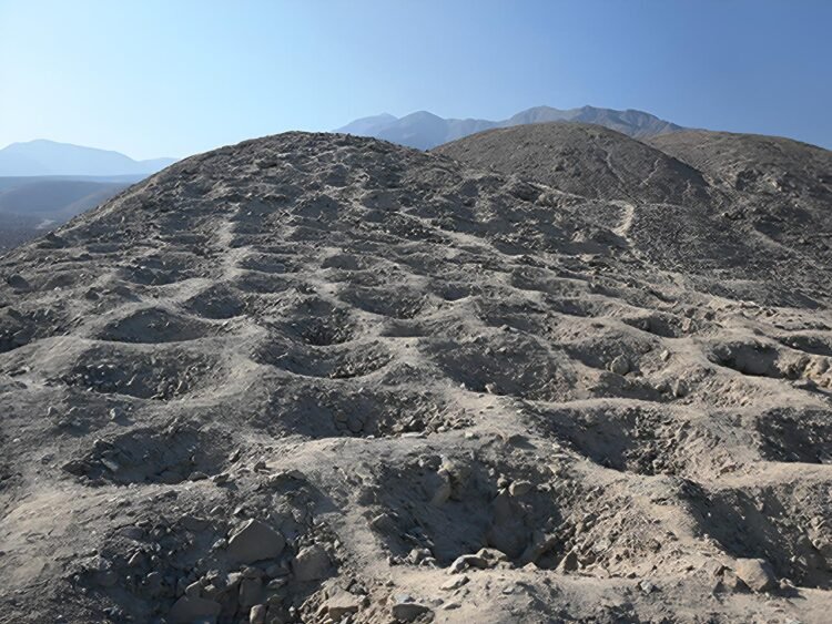 Scientists uncover purpose of 5,200 mystery holes in Peru, revealing a lost Andean system of trade and record-keeping