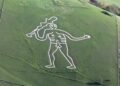 Volunteers restore England’s mysterious Cerne Abbas Giant as climate and erosion threaten ancient landmark