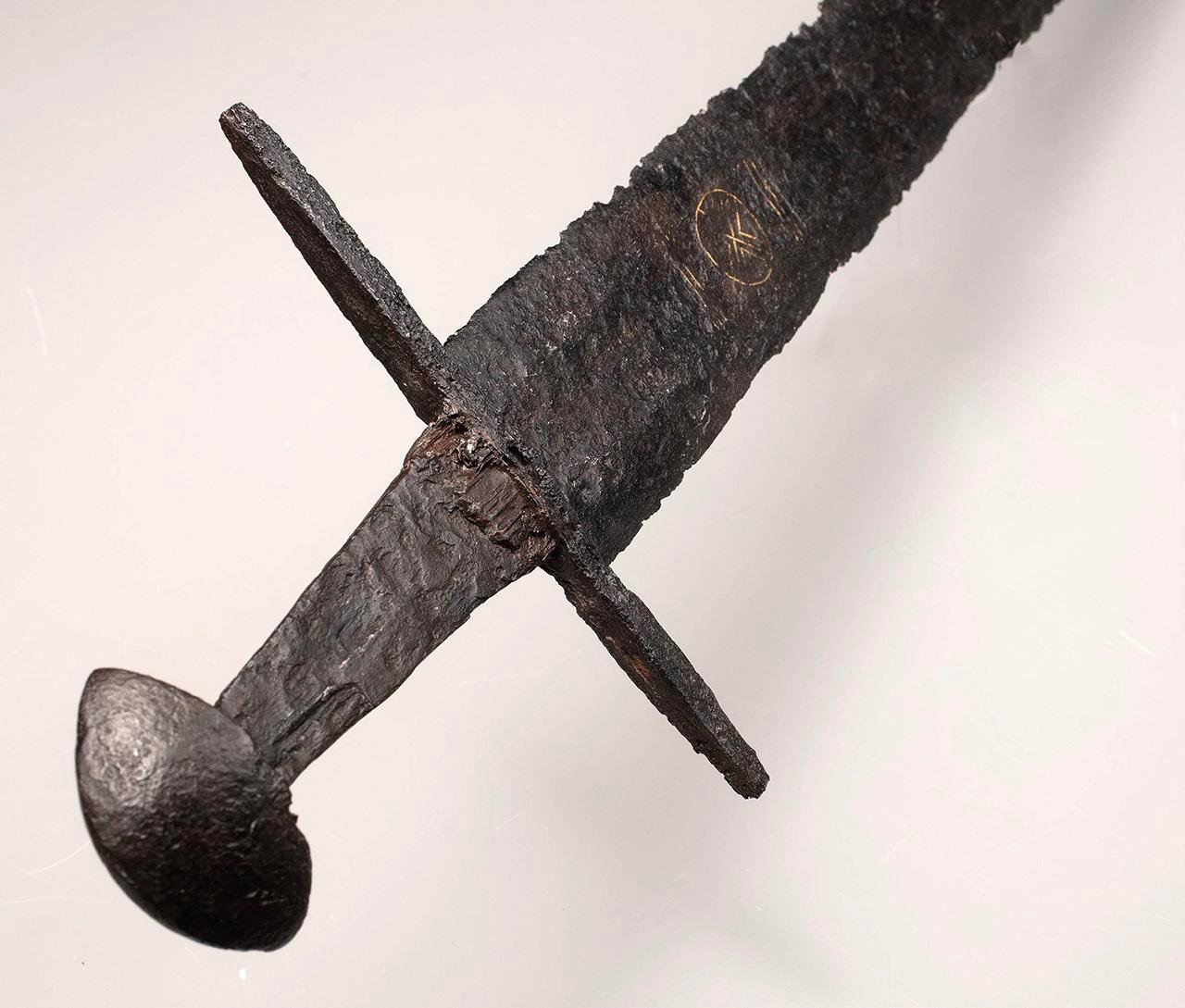 Remarkable 11th-century ritual sword with rare symbolic inlays discovered in Dutch river