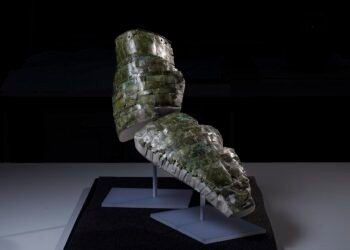 Rare Roman brass arm guard reconstructed from hundreds of fragments