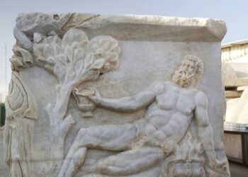Rare Roman sarcophagus showing Dionysus defeating Hercules found in Caesarea