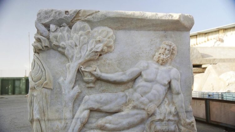Rare Roman sarcophagus showing Dionysus defeating Hercules found in Caesarea