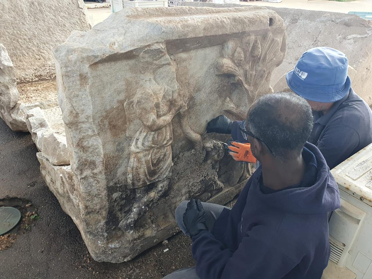 Rare Roman sarcophagus showing Dionysus defeating Hercules found in Caesarea