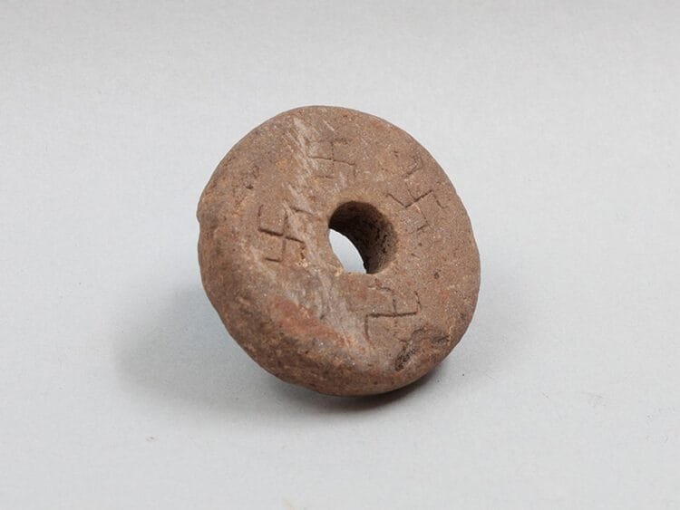 13th century spinning whorl with swastika symbols discovered in Norway