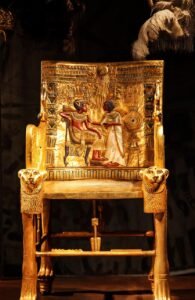 Golden Throne of King Tutankhamun, predominantly made of wood and entirely covered with a layer of pure gold, with some areas inlaid with silver. It is housed in the Egyptian Museum in Cairo, Egypt.